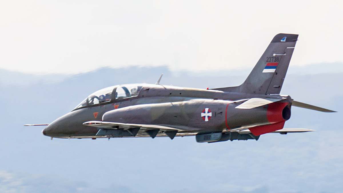 novi sad black jet plane in mid air during daytime 